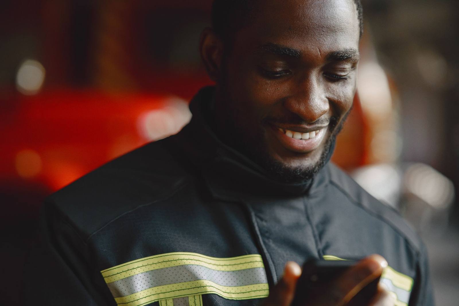 Tradesperson checking a payment on a phone