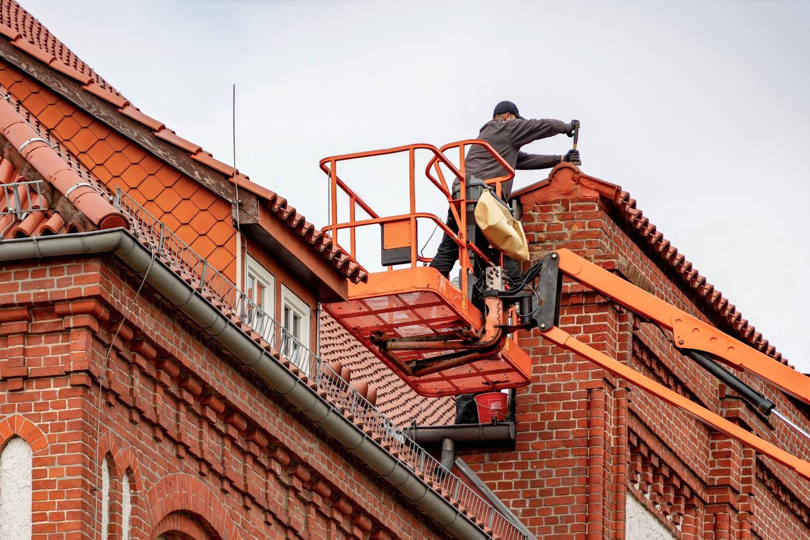 Roofer working on a tiled roof